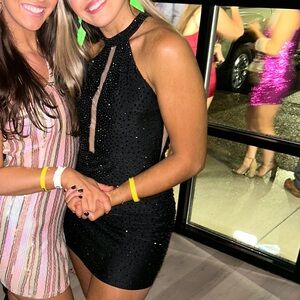 Black mini cocktail dress! Johnathan Kanye!